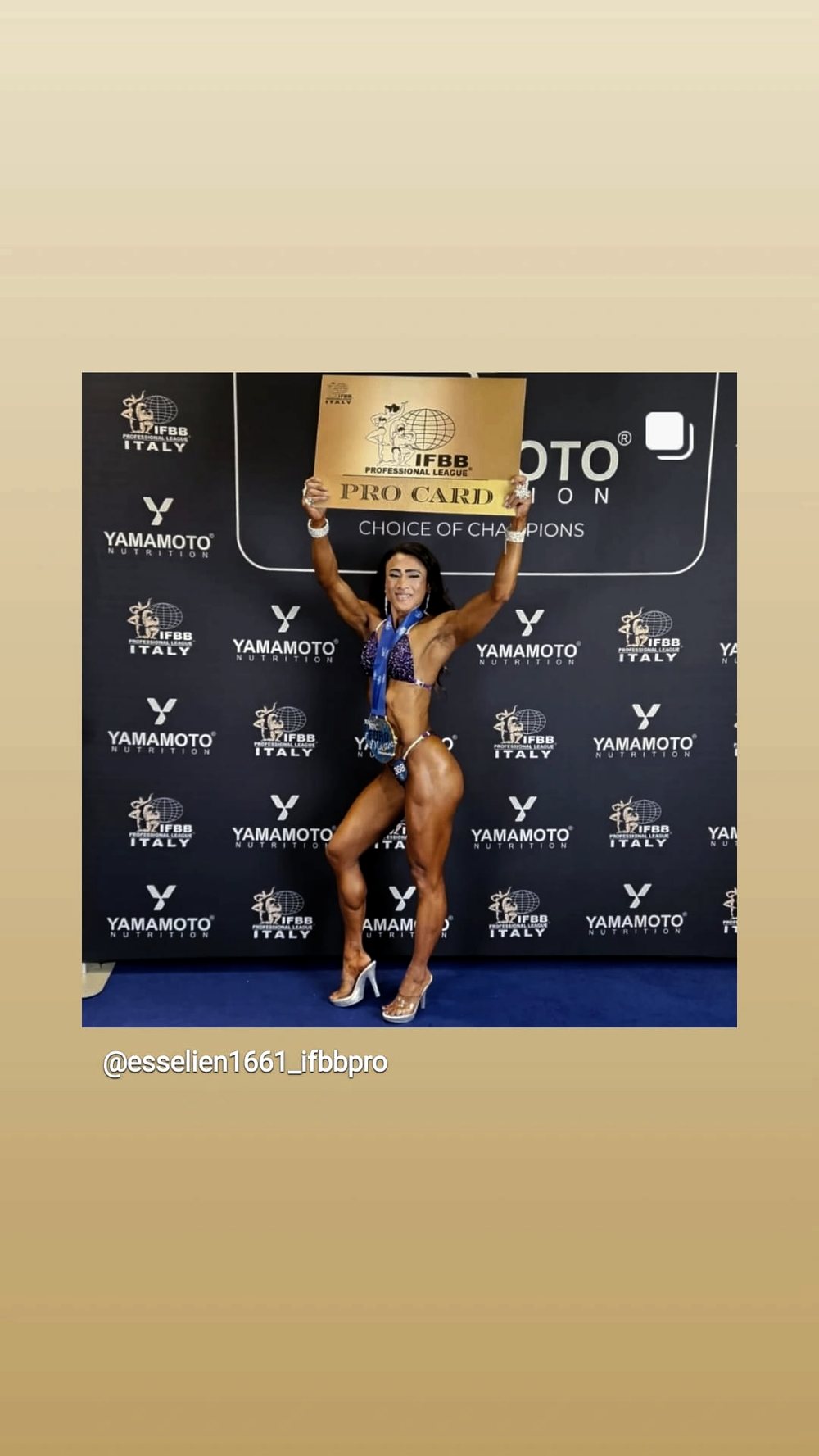 Coached athlete presenting her IFBB Pro Card on stage